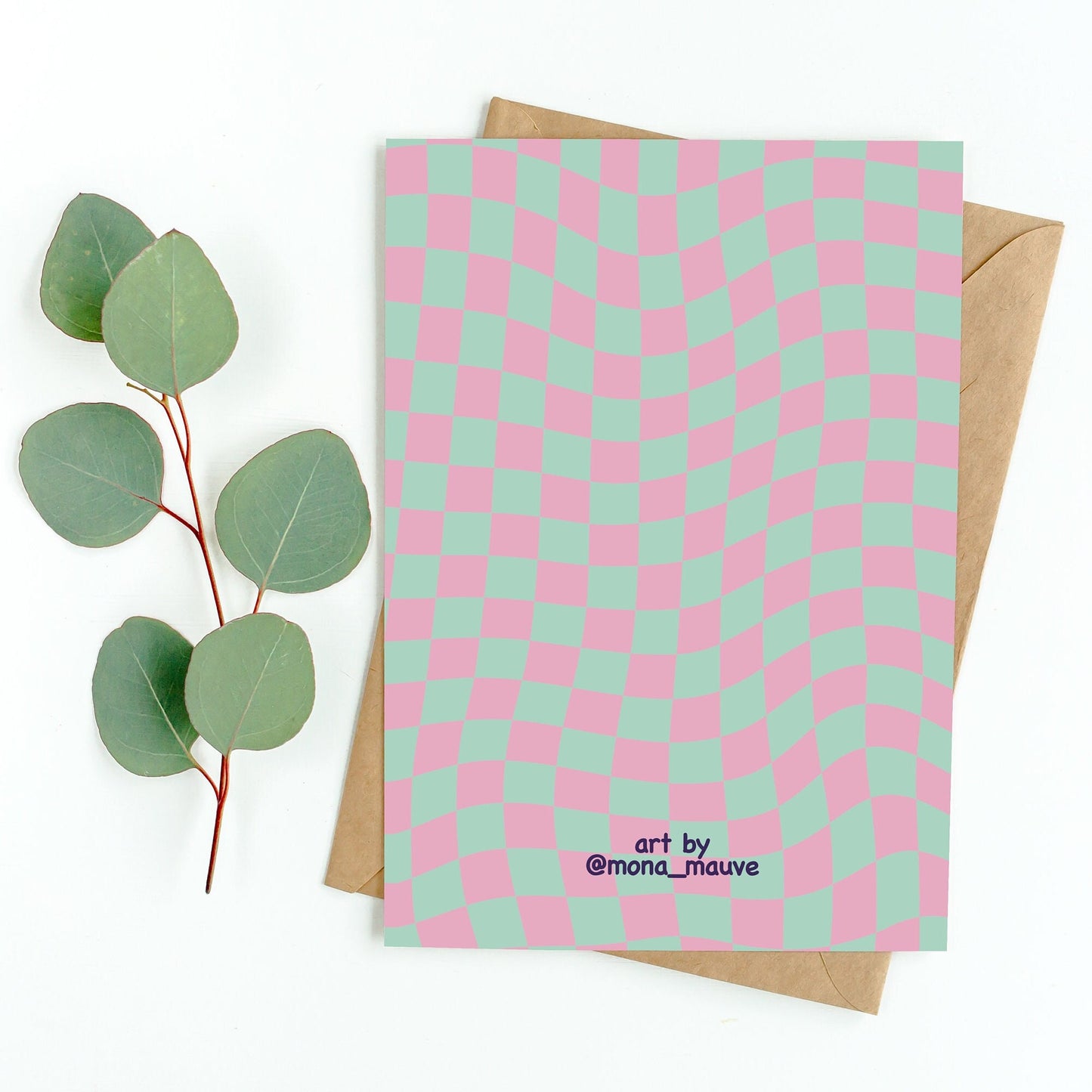 The back of the card. It reads: "Made by Mona Mauve. Thank you for supporting small artists!"
