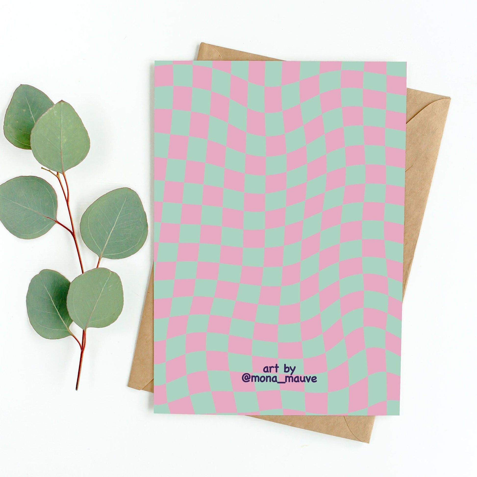 The back of the card. It reads: "Made by Mona Mauve. Thank you for supporting small artists!"