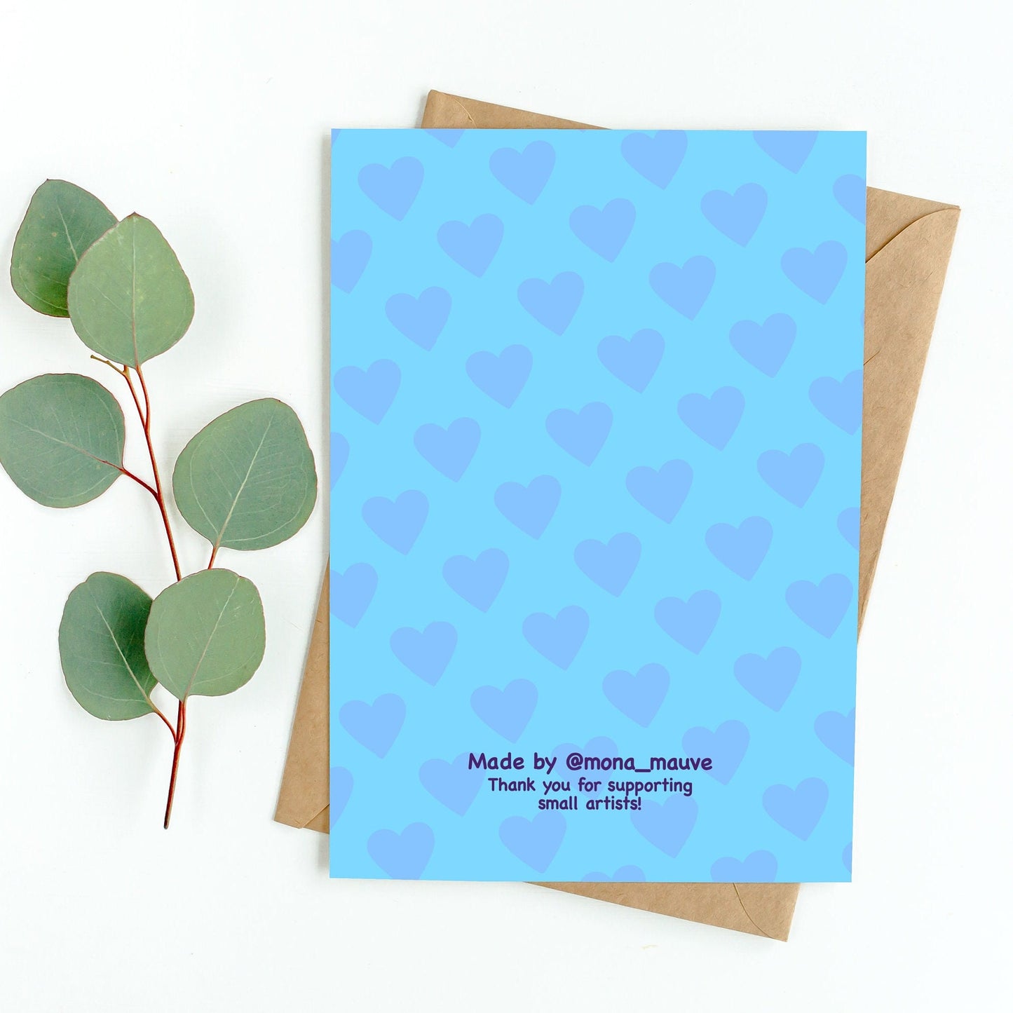 The back of the card. It reads: "Made by Mona Mauve. Thank you for supporting small artists!"