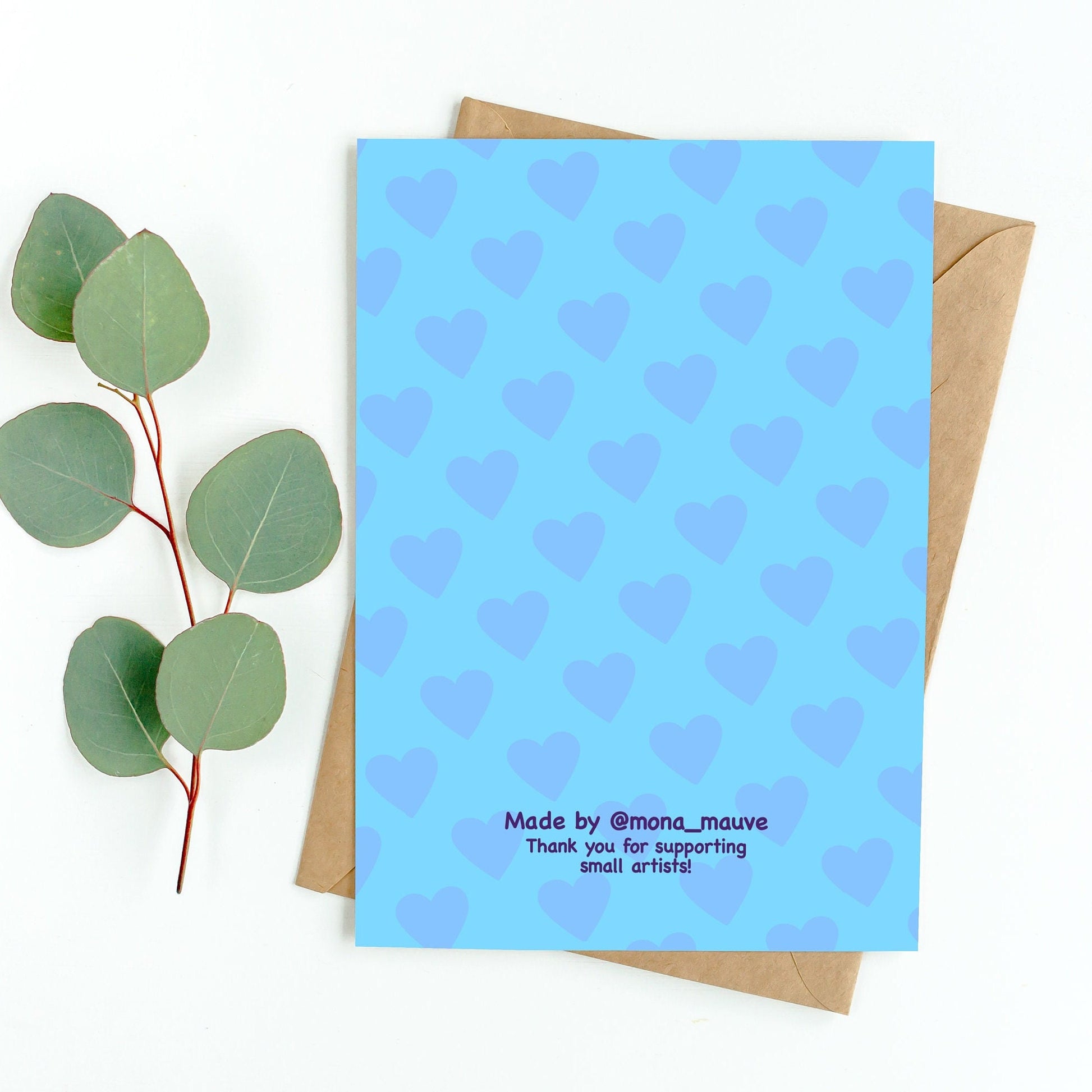 The back of the card. It reads: "Made by Mona Mauve. Thank you for supporting small artists!"