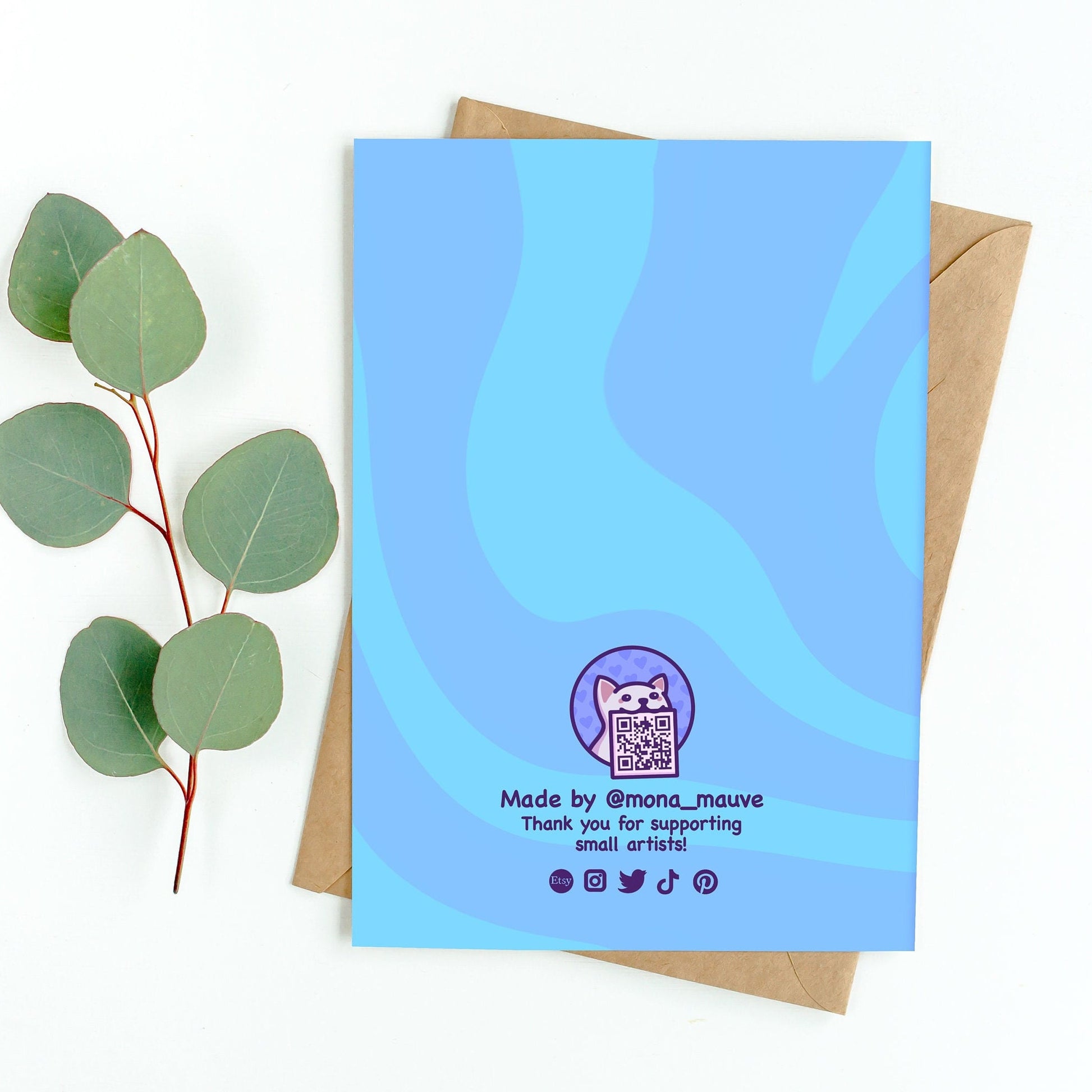 The back of the card. It reads: "Made by Mona Mauve. Thank you for supporting small artists!"