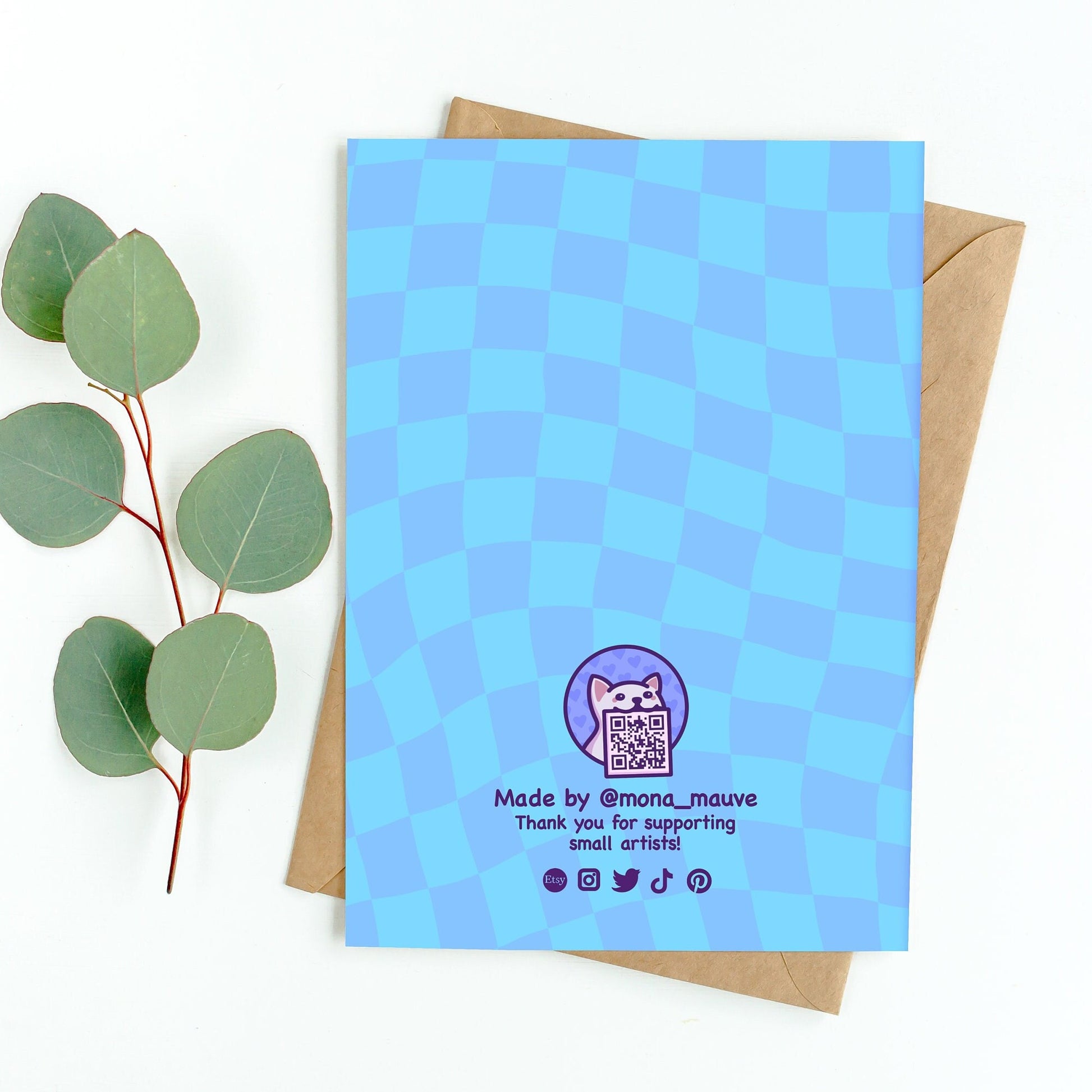The back of the card. It reads: "Made by Mona Mauve. Thank you for supporting small artists!"
