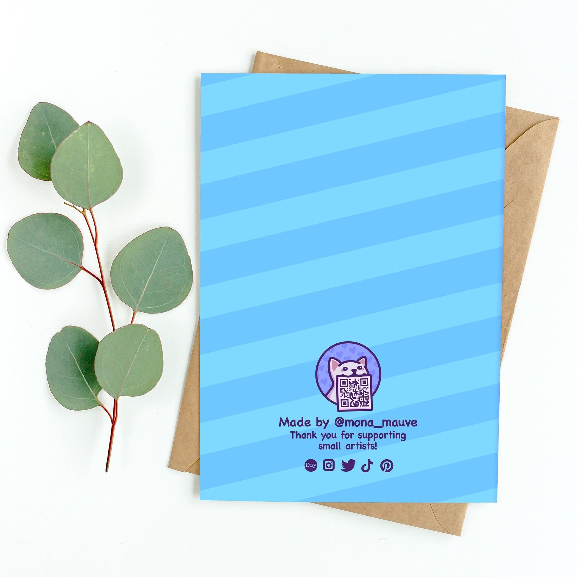 The back of the card. It reads: "Made by Mona Mauve. Thank you for supporting small artists!"