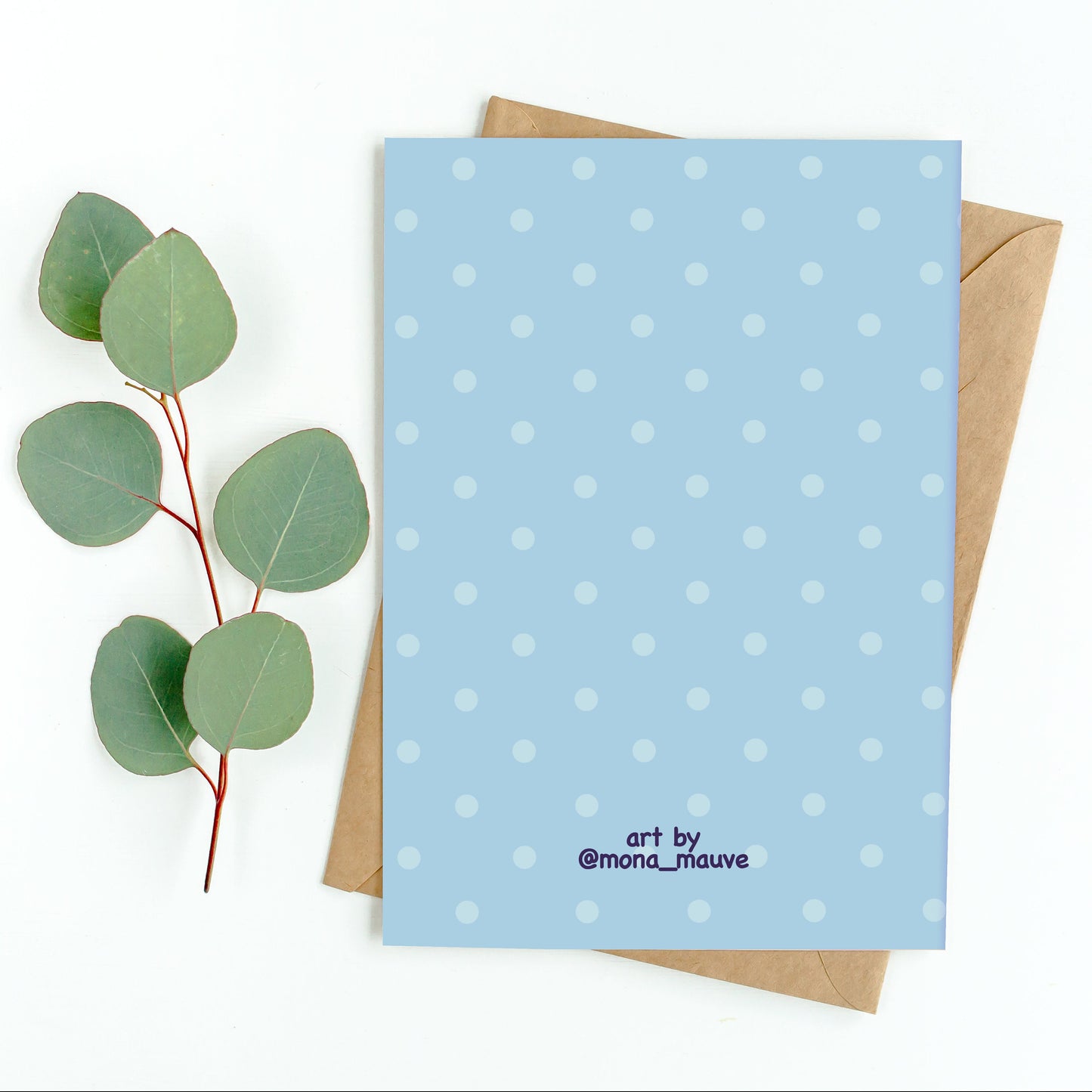 The back of the card. It reads: "Made by Mona Mauve. Thank you for supporting small artists!"