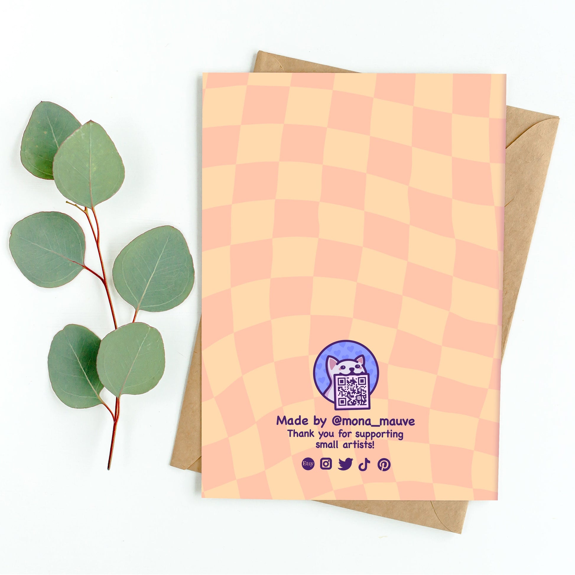 The back of the card. It reads: "Made by Mona Mauve. Thank you for supporting small artists!"