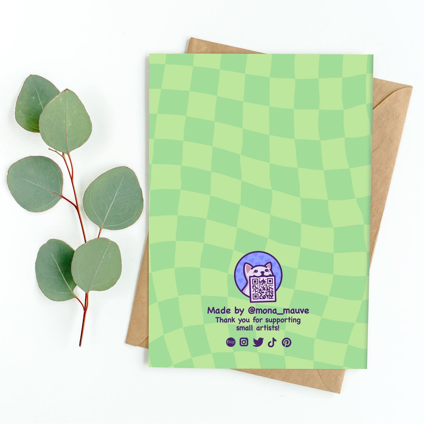 The back of the card. It reads: "Made by Mona Mauve. Thank you for supporting small artists!"