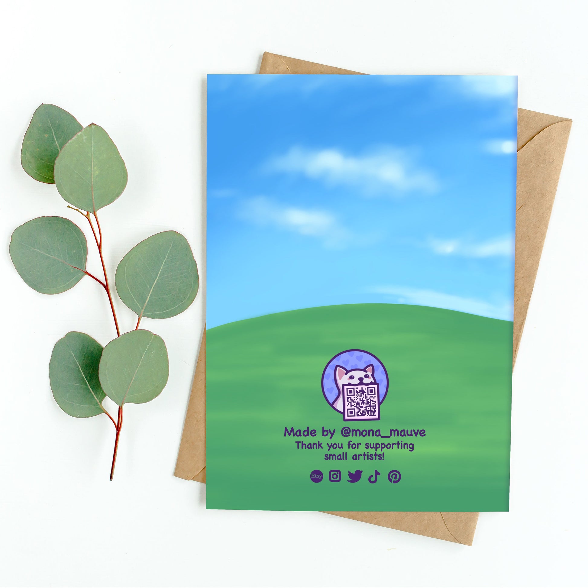 The back of the card. It reads: "Made by Mona Mauve. Thank you for supporting small artists!"