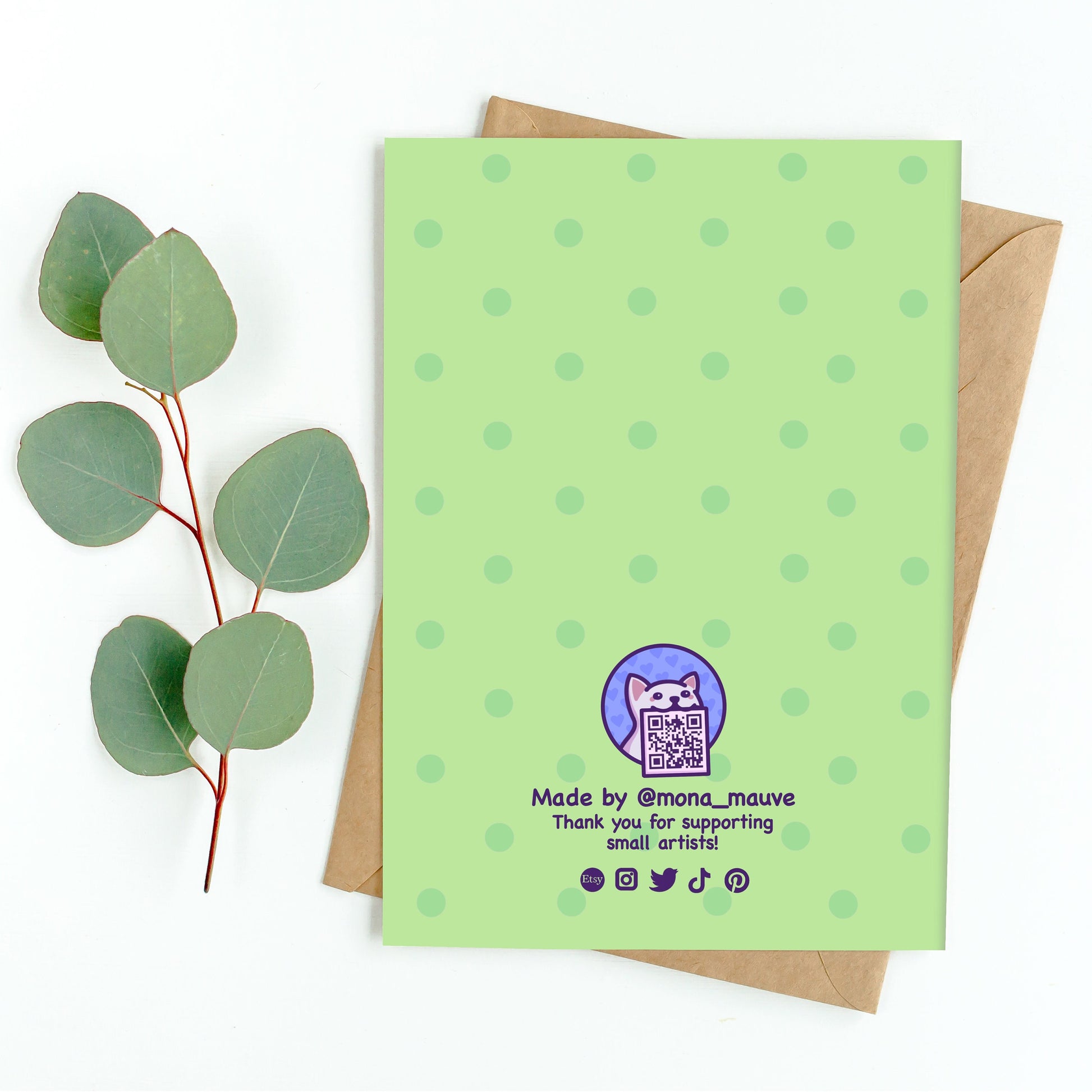 The back of the card. It reads: "Made by Mona Mauve. Thank you for supporting small artists!"