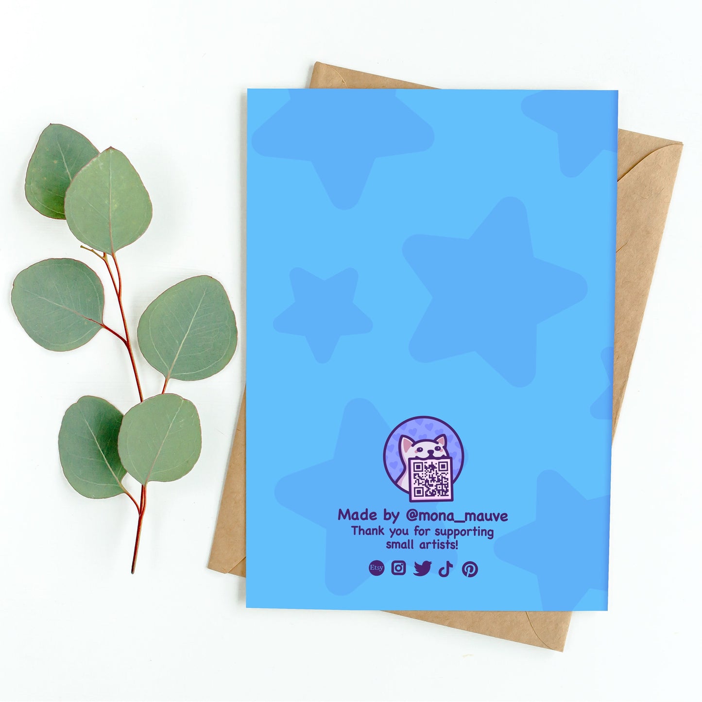 The back of the card. It reads: "Made by Mona Mauve. Thank you for supporting small artists!"